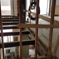 The framework is being done on the Mezzanine floor, making it into a residential floor, rather than being open and looking down onto the main floor.