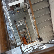 Around and around and around we go! Can't wait to see this staircase refurbished with it's historical elements preserved!
