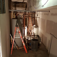 One of the utility rooms under construction in the basement.
