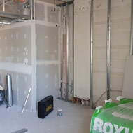Drywalling and taping in an 08 unit.