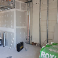 Drywalling and taping in an 08 unit.