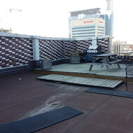 The rooftop patio and BBQ pre-renovation.