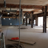 Mezzanine level with it's new floor! No more open ceiling from the main level. This space will be soon transformed into suites with HUGE windows!